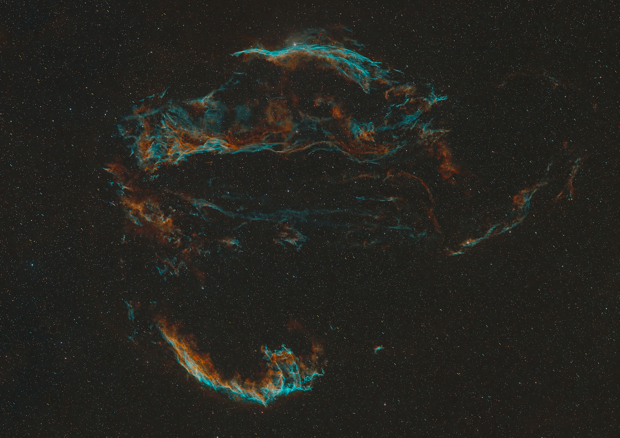 The Cygnus Loop is a large supernova remnant in the constellation Cygnus, an emission nebula measuring nearly 3° across.